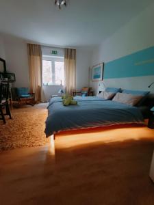 Postel nebo postele na pokoji v ubytování Haus Tourneur