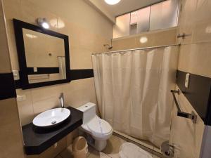 Koupelna v ubytování Pacific Suites Hotel