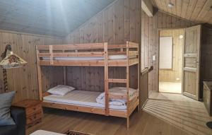 Postel nebo postele na pokoji v ubytování Flott Feriehus - Tjørhom