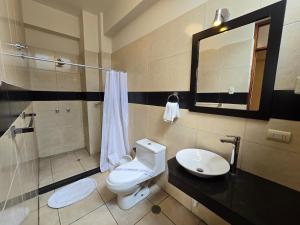 Koupelna v ubytování Pacific Suites Hotel