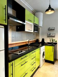 Kuchyňa alebo kuchynka v ubytovaní Green Duplex MM City Center