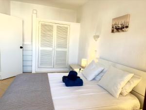 Ένα ή περισσότερα κρεβάτια σε δωμάτιο στο Apartment Les 3 Dauphins in Albufeira +31 φωτογραφίες