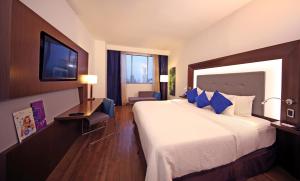 Ein Bett oder Betten in einem Zimmer der Unterkunft Novotel Panama City