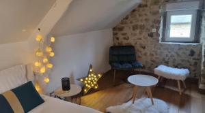Posezení v ubytování Chambre Colomby Kaabi Marina