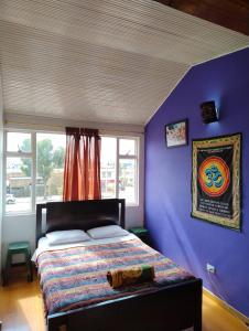 Llit o llits en una habitació de ZIPA HOSTEL