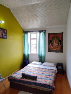 Llit o llits en una habitació de ZIPA HOSTEL