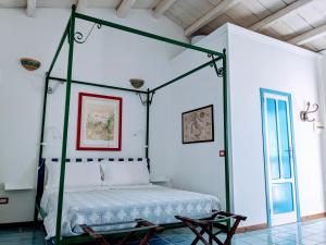 Voodi või voodid majutusasutuse Le Dimore del Pescatore nel Porto di Sciacca - La Nica - toas