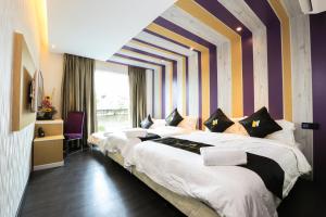Postel nebo postele na pokoji v ubytování Mercury Boutique Hotel + 37 fotografií