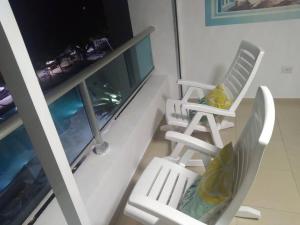TV a/nebo společenská místnost v ubytování Beach Front Ap Juan Dolio Marbella