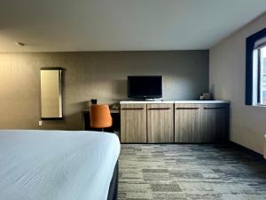 TV a/nebo společenská místnost v ubytování Modesto Hotel - Suite A