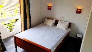 Postel nebo postele na pokoji v ubytování Sweden Inn Guesthouse