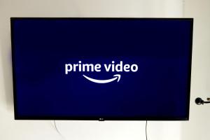 a tv screen with the name prime video on it at Inners City Apartments -On Suites in Birmingham