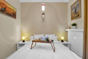 Llit o llits en una habitació de Kasprzaka39 Apartments - Parking, Balcony, Targi Expo - by Rentujemy