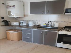 Kjøkken eller kjøkkenkrok på Solar Suites