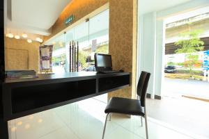 TV a/nebo společenská místnost v ubytování Mercury Boutique Hotel