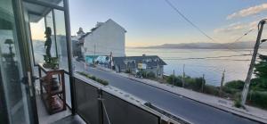 a view of a road from a window of a house at Departamento Calle España - Vista Lago in San Carlos de Bariloche
