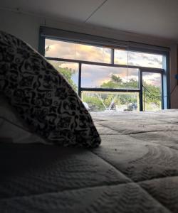 Uma cama ou camas num quarto em Magic Hause Patagonia