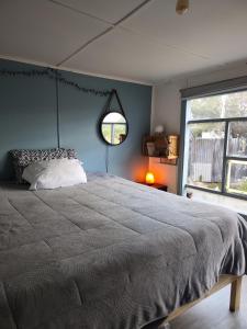 Uma cama ou camas num quarto em Magic Hause Patagonia
