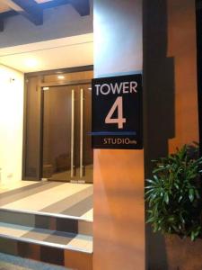 a sign that reads tower in a building at 3 Beds Filinvest Alabang in Manila