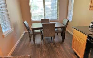 a dining room with a table and chairs at 3-Bedroom Luxury Condo in the Heart of the City in Salt Lake City
