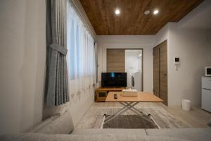 TV a/nebo společenská místnost v ubytování ASTORIA【2min from Asahikawa sta】