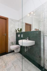 Kúpeľňa v ubytovaní Grottger Luxury Boutique Hotel City
