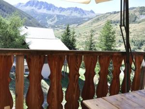 a balcony with a view of the mountains at Chalet Vars, 6 pièces, 12 personnes - FR-1-773-13 in Vars