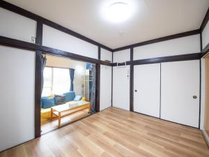 Postel nebo postele na pokoji v ubytování 富津屋 Futtsuya