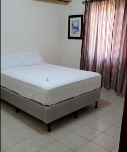Krevet ili kreveti u jedinici u objektu Casa en Puerto Cortes( playa)