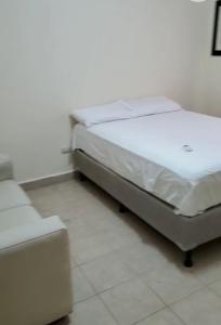 Postelja oz. postelje v sobi nastanitve Casa en Puerto Cortes( playa)