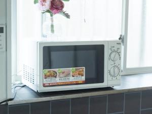 TV a/nebo společenská místnost v ubytování 富津屋 Futtsuya