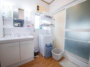 Koupelna v ubytování 富津屋 Futtsuya + 21 fotografií