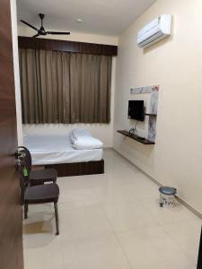 Postel nebo postele na pokoji v ubytování Jawai Rock Hotel