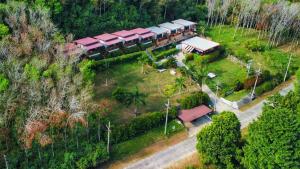 an aerial view of a house with a train at Resting Place Ko Yao Yai in Ko Yao Yai