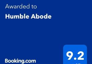 Certifikát, hodnocení, plakát nebo jiný dokument vystavený v ubytování Humble Abode