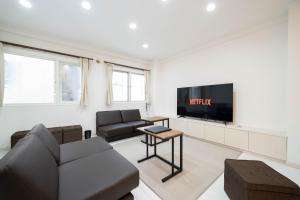 Μια τηλεόραση ή/και κέντρο ψυχαγωγίας στο world inn Susukino