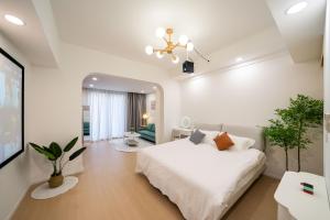 Posteľ alebo postele v izbe v ubytovaní Cloud Expo Apartment