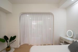 Posteľ alebo postele v izbe v ubytovaní Cloud Expo Apartment