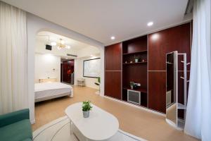 Posteľ alebo postele v izbe v ubytovaní Cloud Expo Apartment