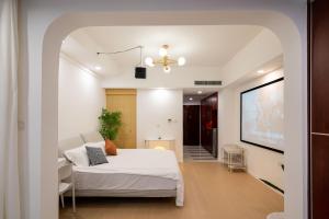 Posteľ alebo postele v izbe v ubytovaní Cloud Expo Apartment