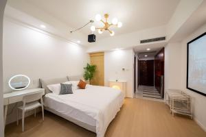 Posteľ alebo postele v izbe v ubytovaní Cloud Expo Apartment