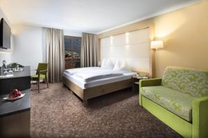 Postel nebo postele na pokoji v ubytování Hotel Metzgerwirt + 37 fotografií