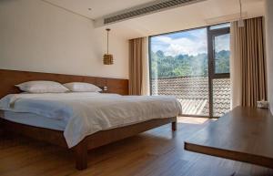 Galeriebild der Unterkunft Fanzhu Hotel in Xingyi