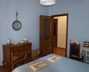 Postel nebo postele na pokoji v ubytování B&B Vigneto Pardom