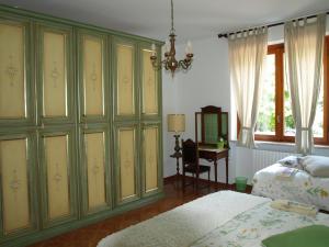 Postel nebo postele na pokoji v ubytování B&B Vigneto Pardom