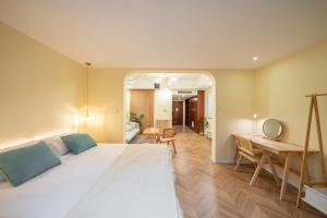Posteľ alebo postele v izbe v ubytovaní Cloud Expo Apartment