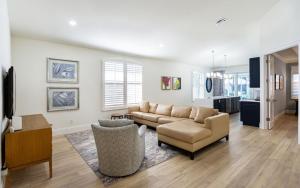 a living room with a couch and a chair at Tuscan Vacation Rental in Naples