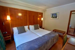 Uma cama ou camas num quarto em Coma Bella