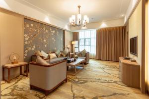 Χώρος καθιστικού στο Hua Long Hotel Lancang