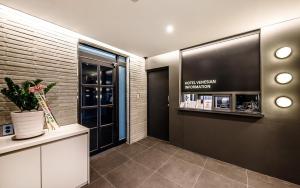 Kuchyň nebo kuchyňský kout v ubytování Hotel Venesian